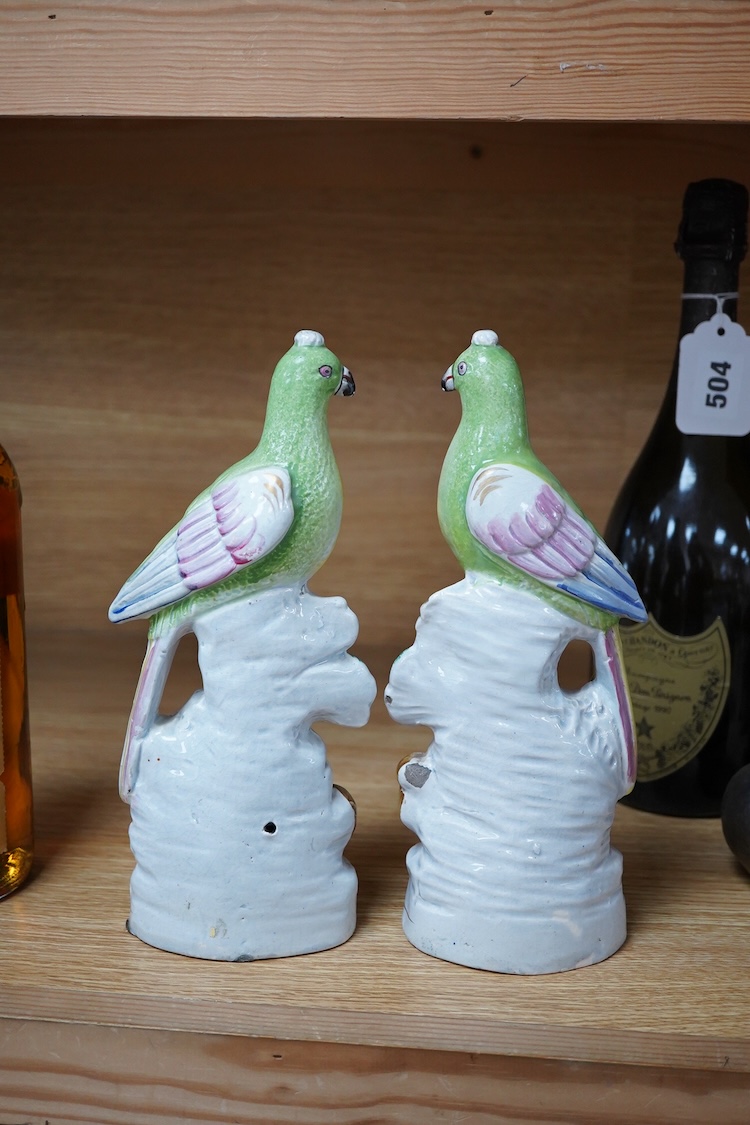 A pair of early 19th century pearlware parrots, ex John Howard, 24cm high